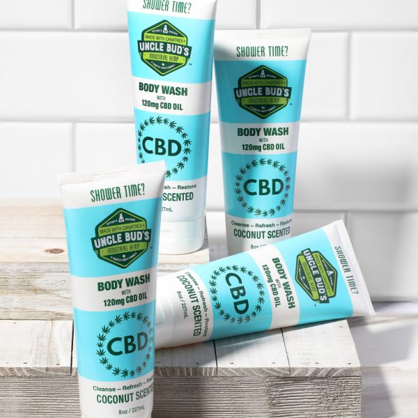 4 pack of uncle Bud's 120mg CBD body wash with tile background.